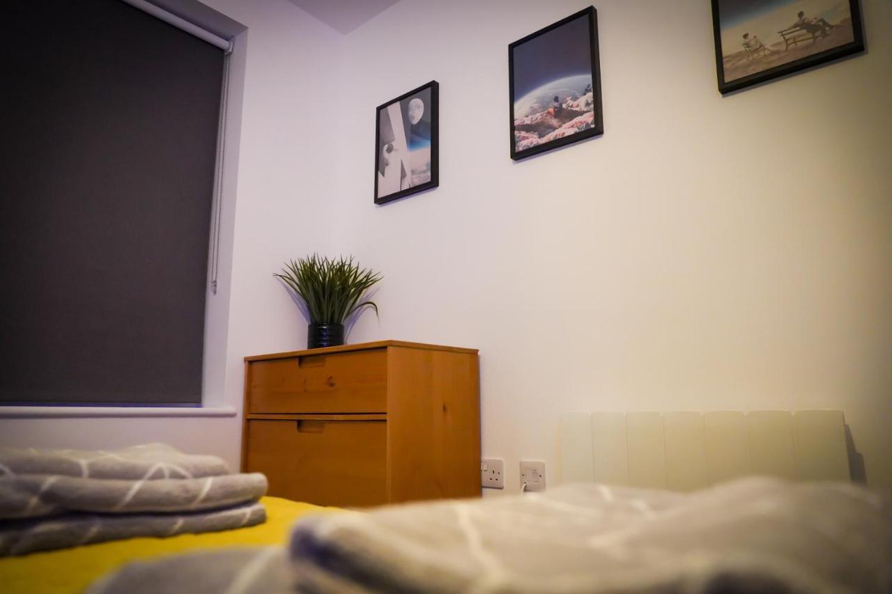 Neon Road At Park House Centre Apartment Peterborough
